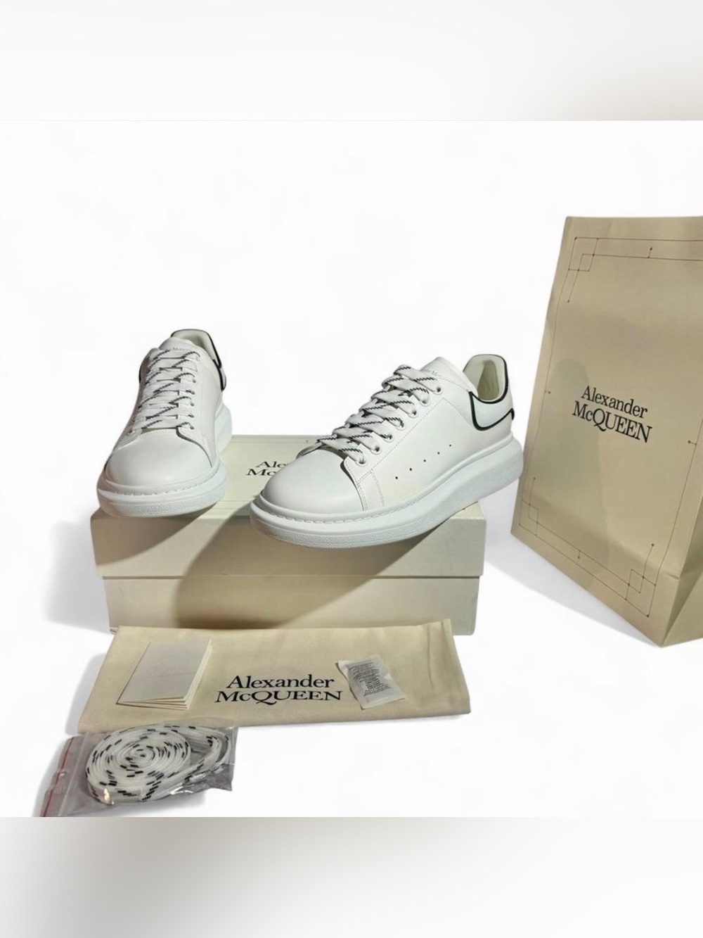 Alexander McQueen white & black leather sneakers
Men’s 6.5/7 - women’s 8.5/9
